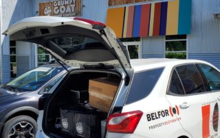 BELFOR vehicle with 45 pounds of fresh roasted coffee from Grumpy Goat Coffee roastery along with brewing equipment and coffee supplies donated by Stan’s Coffee, BELFOR and M&M Multimedia.
